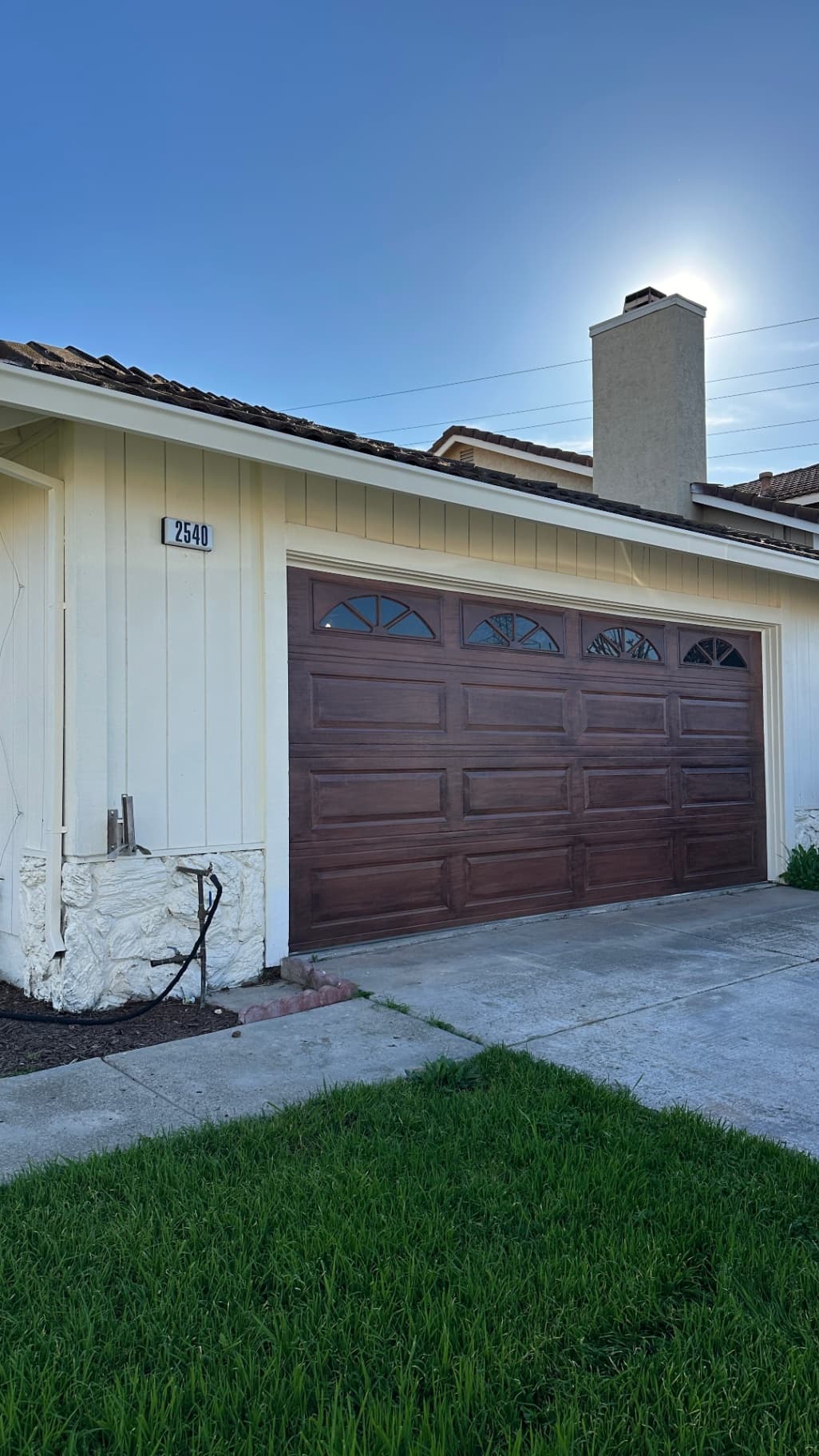 How to Paint a Faux Wood Garage Door